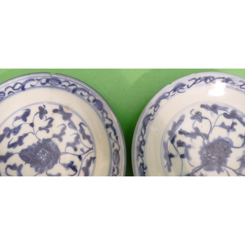 117 - 2 x Early Oriental Small Round Dishes on blue and white ground having building and river landscape d... 