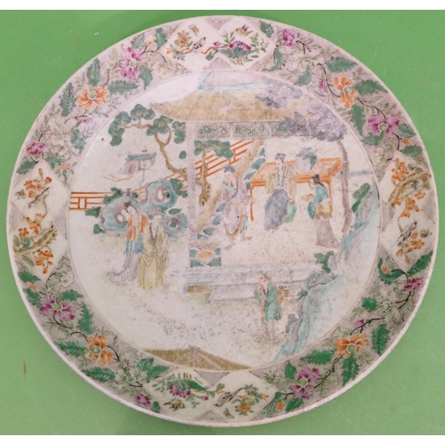 120 - A 19th Century Oriental Charger having multicoloured figure, bird, floral, leaf and scroll decoratio... 