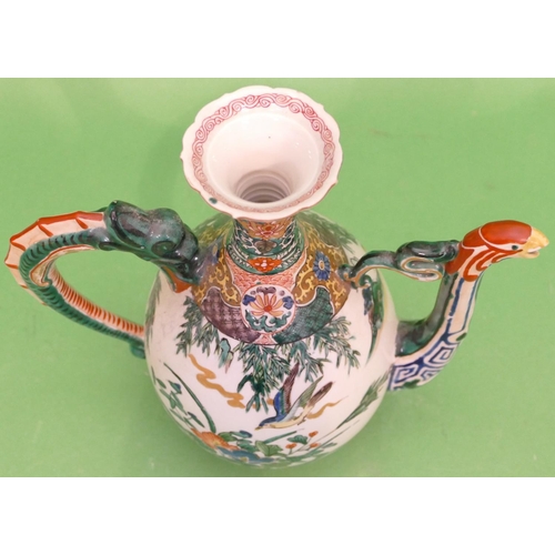 121 - An Oriental Round Bulbous Thin Necked Trumpet Shaped Coffee Pot on white ground with multicoloured, ... 