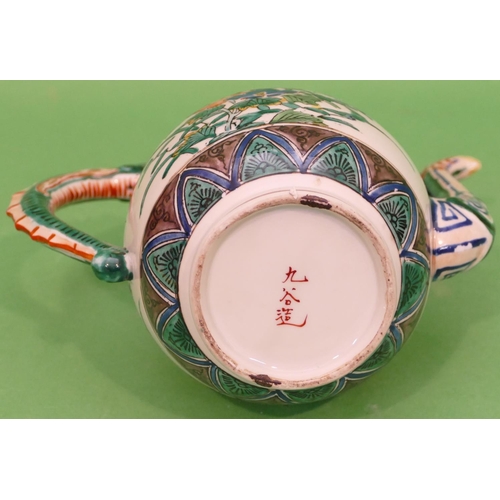 121 - An Oriental Round Bulbous Thin Necked Trumpet Shaped Coffee Pot on white ground with multicoloured, ... 