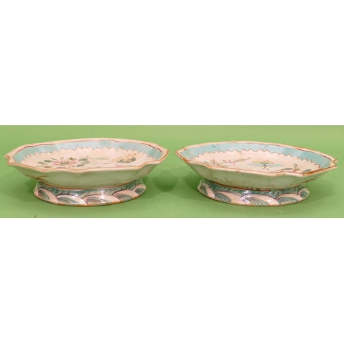 119 - A Pair of Oriental Round Scallop Shaped Shallow Comports on white and turquoise ground with enamelle... 