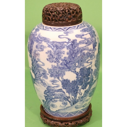 148 - An 18th Century Chinese Blue and White Round Bulbous Shaped Lidded Ginger Jar having carved wooden p... 