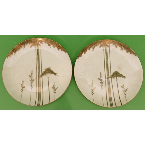 16 - A Pair of Oriental Round Chargers on white ground having gilt bamboo decoration, 31.7cm diameter.