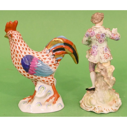 19 - A Herend China Figure of a cockerel on multicoloured ground, 14cm high, also a continental china fig... 