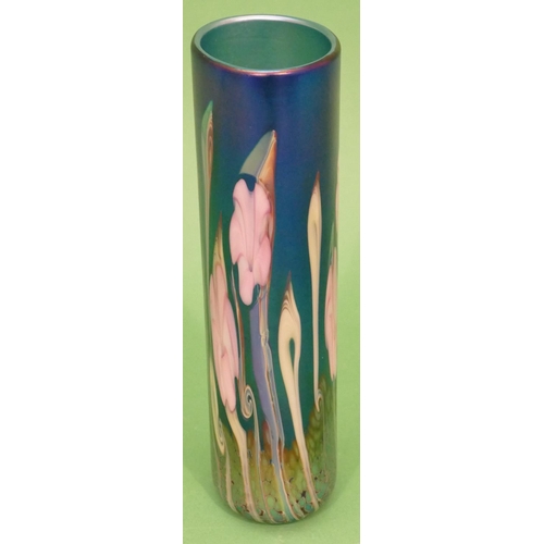 3 - An Okra Iridescent Glass Vase on blue ground with multicoloured floral and leaf decoration, signed R... 