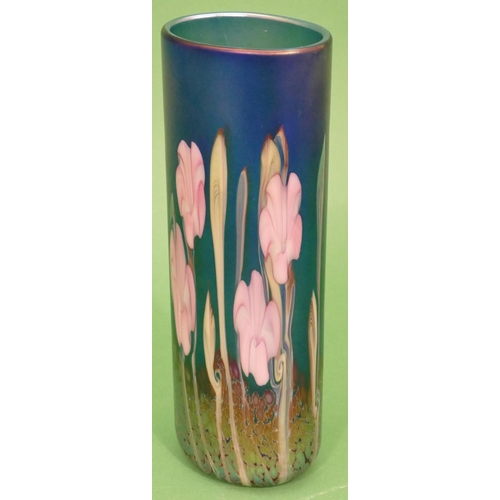 3 - An Okra Iridescent Glass Vase on blue ground with multicoloured floral and leaf decoration, signed R... 