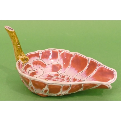 35 - An Oriental Leaf Shaped Dish with stork shaped spout, on pink and green ground, 17.5cm wide.