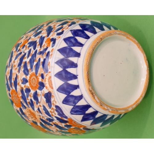 43 - A 19/20th Century Imari Round Bulbous Thin Necked Vase on white, red and blue ground having all over... 