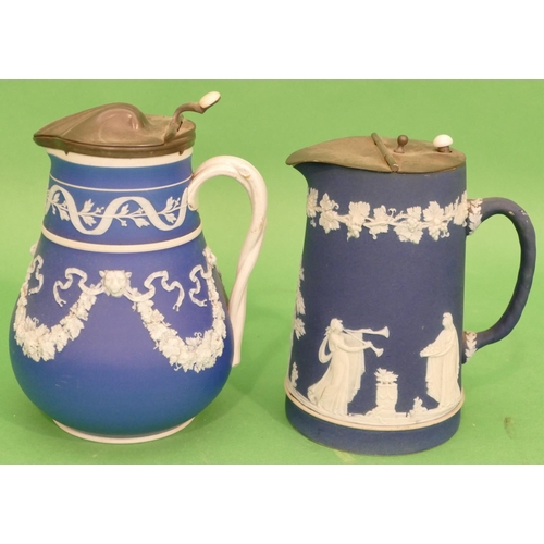 51 - An Adam's Jasperware Blue and White Jug having pewter lid, having raised classical figure decoration... 