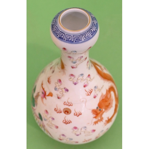 81 - An Oriental Bulbous Thin Necked Vase on white and blue ground with multicoloured, dragon and phoenix... 