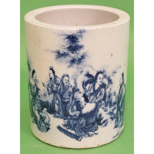 85 - An Oriental Blue and White Cylindrical Brush Pot having figure and inscription decoration, 15cm high... 