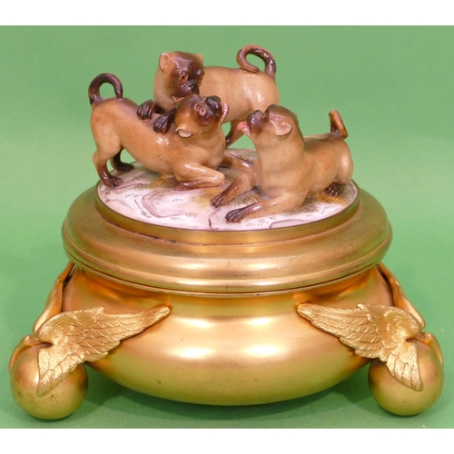 95 - A 19th Century Gilt Metal Round Bulbous Inkwell with Dresden porcelain lid depicting 3 pug dogs, rep... 