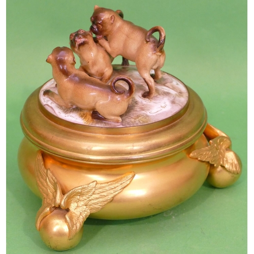 95 - A 19th Century Gilt Metal Round Bulbous Inkwell with Dresden porcelain lid depicting 3 pug dogs, rep... 