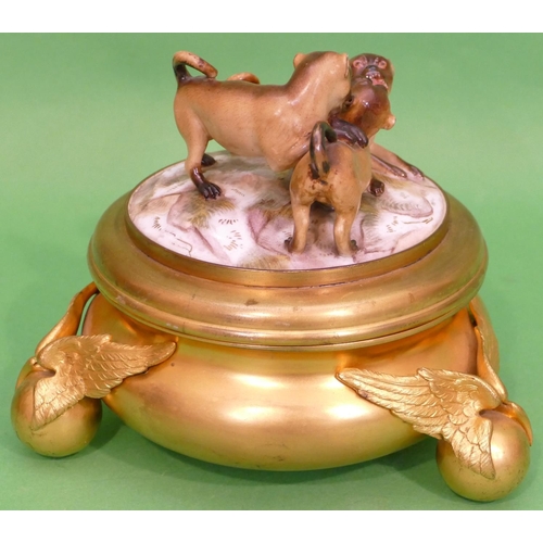 95 - A 19th Century Gilt Metal Round Bulbous Inkwell with Dresden porcelain lid depicting 3 pug dogs, rep... 