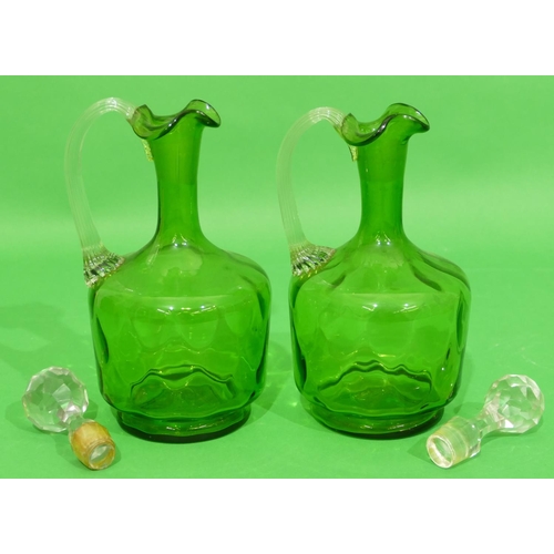 12 - A Pair of Victorian Green and Clear Glass Round Bulbous Thin Necked Claret Jugs with stoppers, 25cm ... 