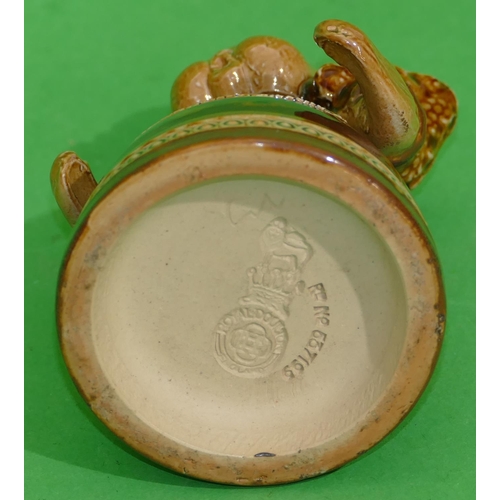 179 - A Doulton Lambeth Glazed Earthenware Baby Inkwell having hinged body, 8.5cm high.