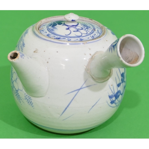 44 - An Oriental Round Bulbous Shaped Teapot with side handle on blue and white ground having floral and ... 