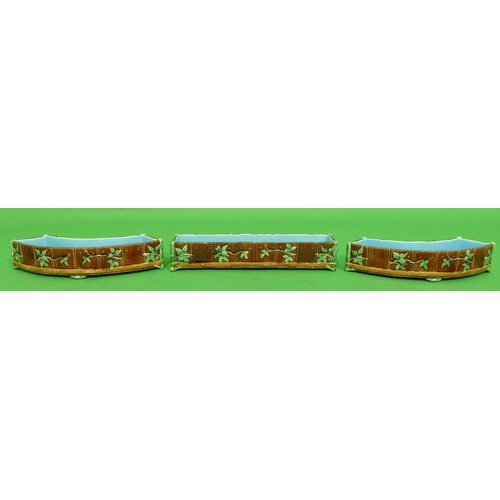 65 - 3 Minton Majolica Trough Shaped Dishes on brown and turquoise ground with raised leaf decoration, nu... 