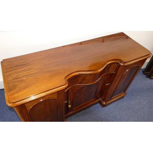 767 - A 19th Century Mahogany Serpentine Fronted Sideboard having centre drawer with panelled door below, ... 