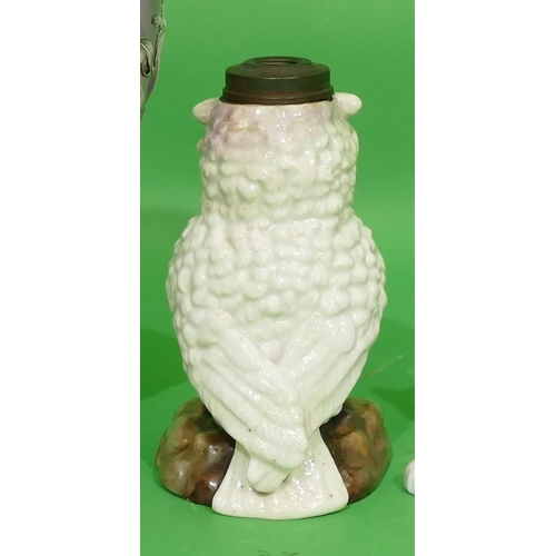 82 - A China Paraffin Lamp Base in form of an owl having glass eyes (no bowl to top) 17cm high.