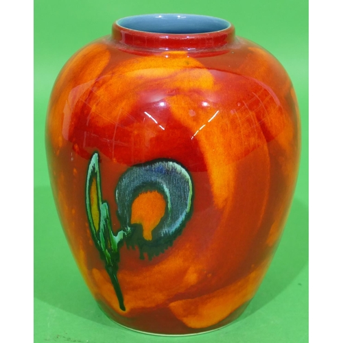 87 - A Poole Round Bulbous Thin Necked Vase on vibrant red ground, 16cm high.