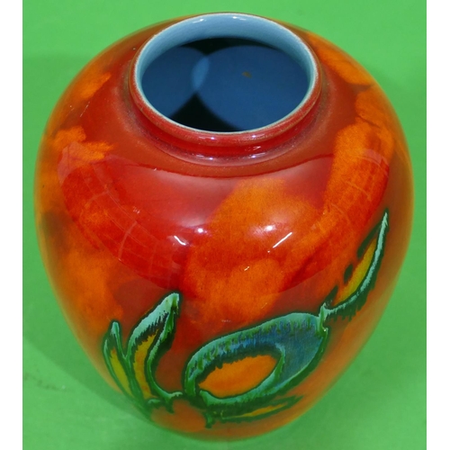 87 - A Poole Round Bulbous Thin Necked Vase on vibrant red ground, 16cm high.