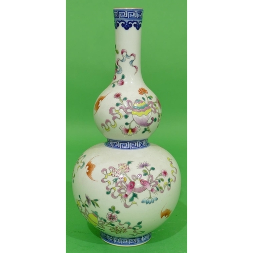 49 - An Oriental Gourd Shaped Vase on white and blue ground with multicoloured floral, leaf and bat decor... 