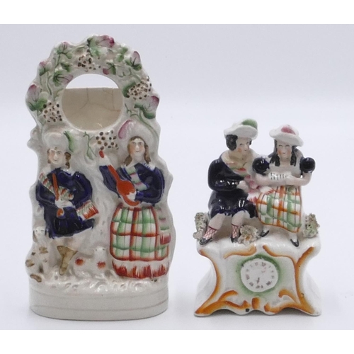 1 - A 19th Century Staffordshire clock group of 2 seated figures (neck restored), 15cm high, a 19th cent... 