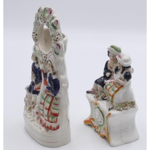 1 - A 19th Century Staffordshire clock group of 2 seated figures (neck restored), 15cm high, a 19th cent... 