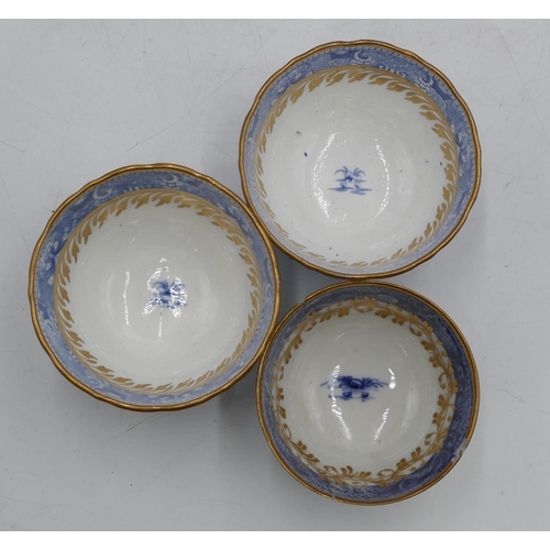 103 - 3 Caughley style tea bowls on blue and white ground with willow pattern and gilt decoration, (smalle... 