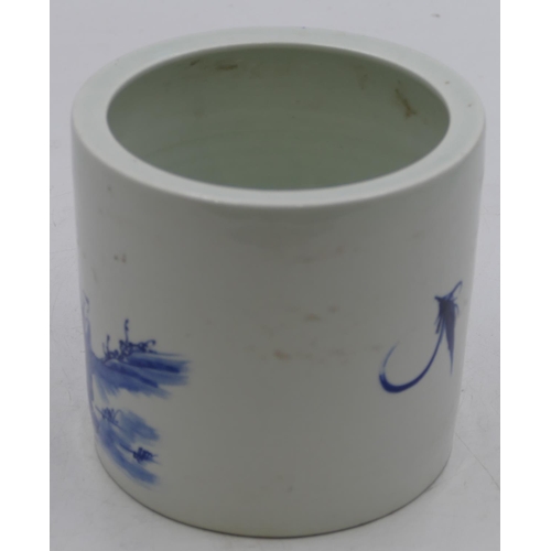 113 - An Oriental cylindrical brush pot on white and blue ground with figure decoration, 13cm high.