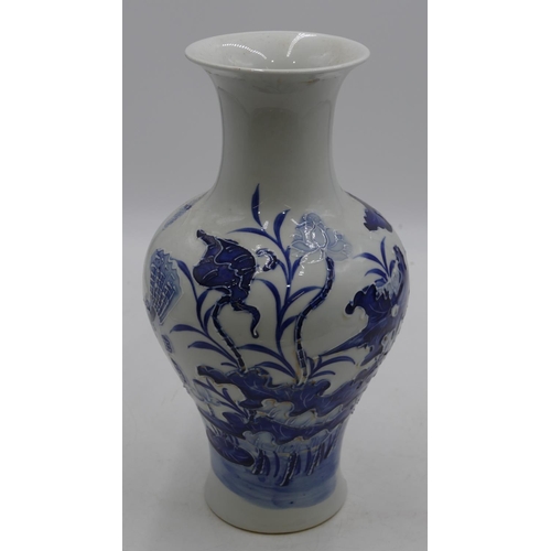 116 - An Oriental round bulbous thin necked trumpet shaped vase on blue and white ground with raised insec... 