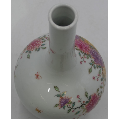 118 - An Oriental round bulbous thin necked vase on white ground with multi-coloured blossom and leaf deco... 