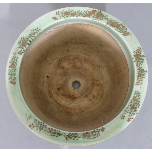 119 - An Oriental glazed earthenware round trumpet shaped jardiniere on green ground and tree, branch, flo... 