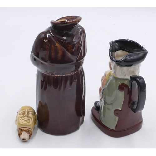 12 - A Beswick bottle in the form of a monk with removable head, 21cm high, standing on scallop shaped tr... 
