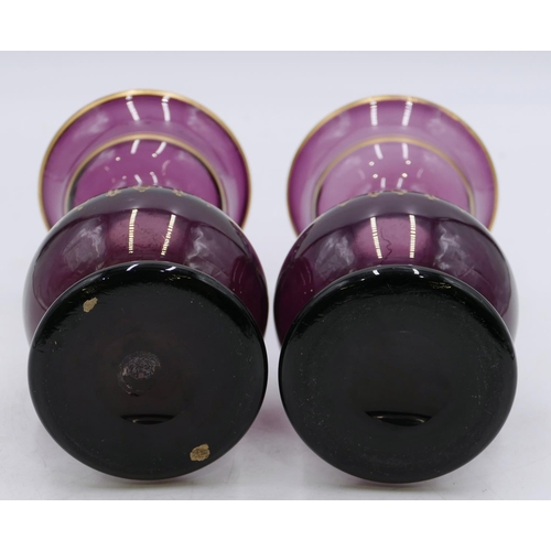 123 - A pair of Victorian purple glass round bulbous thin necked trumpet shaped vases with gilt decoration... 