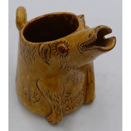 125 - Horace Elliott, Ewenny pottery yellow glazed scraffito decorated zoomorphic jug in form of a caricat... 