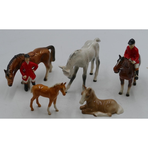 134 - A small Beswick chestnut horse 8.5cm high, a Beswick figure of a horse on white ground (ear chipped)... 