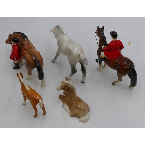 134 - A small Beswick chestnut horse 8.5cm high, a Beswick figure of a horse on white ground (ear chipped)... 