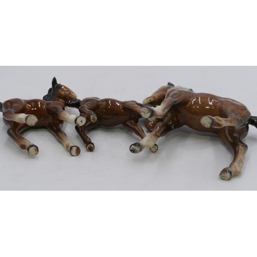 135 - 3 Beswick figures of foals, largest 15cm long, 15cm high. (3)