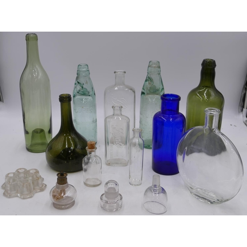 144 - A Castle Brewery glass bottle with inner ball stopper, another similar Copes bottle, a green glass b... 