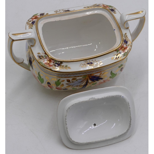 148 - A 19th Century Spode style rectangular bulbous shaped lidded sugar bowl on white ground with multico... 