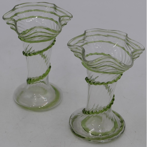 150 - A pair of round glass trumpet shaped vases with crinkled rim, raised green twist decoration on round... 