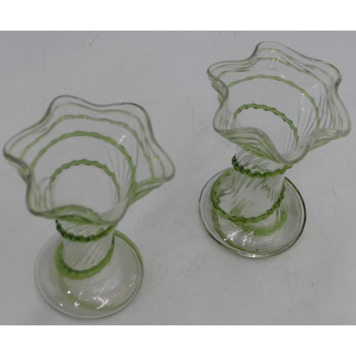 150 - A pair of round glass trumpet shaped vases with crinkled rim, raised green twist decoration on round... 