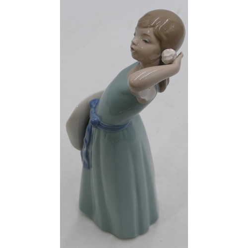 155 - A Lladro figure of a young girl holding a flower and bonnet, 24cm high