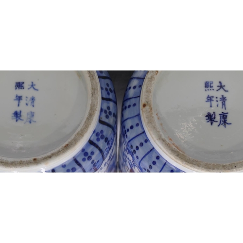 156 - A pair of 19th Century Chinese round bulbous trumpet shaped vases on white and blue ground with mult... 