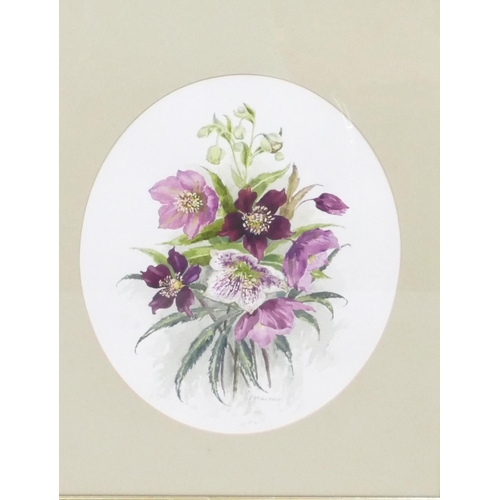 174 - P Mansey oval still life watercolour depicting flowers, in green frame, 34 x 28.5cm.