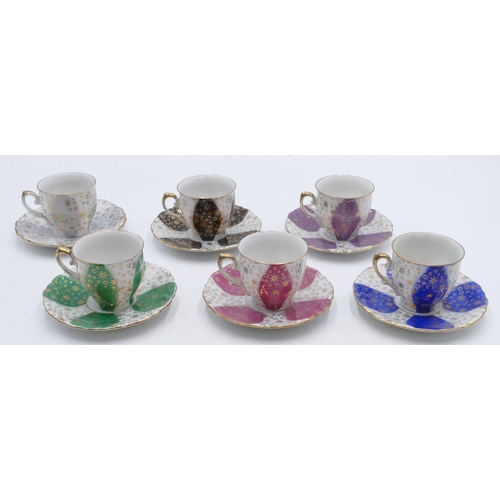22 - A set of 6 Bavarian Winterling coffee cups and saucers on various coloured ground, all with gilt dec... 