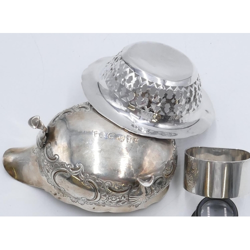 232 - A George III silver sauce boat (handle missing) with allover embossed floral and scroll decoration a... 