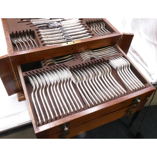 235 - An Argyle silver plated 12 place setting flatware service in fitted oak canteen with hinged lid and ... 